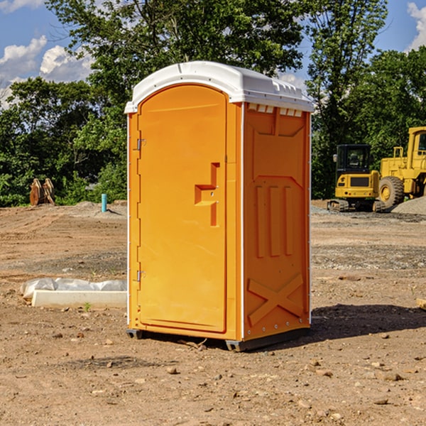 how often are the portable restrooms cleaned and serviced during a rental period in Lublin WI